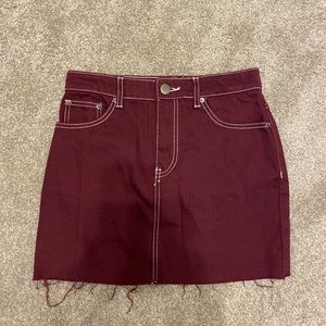 Burgundy skirt with white stitching! So cute!